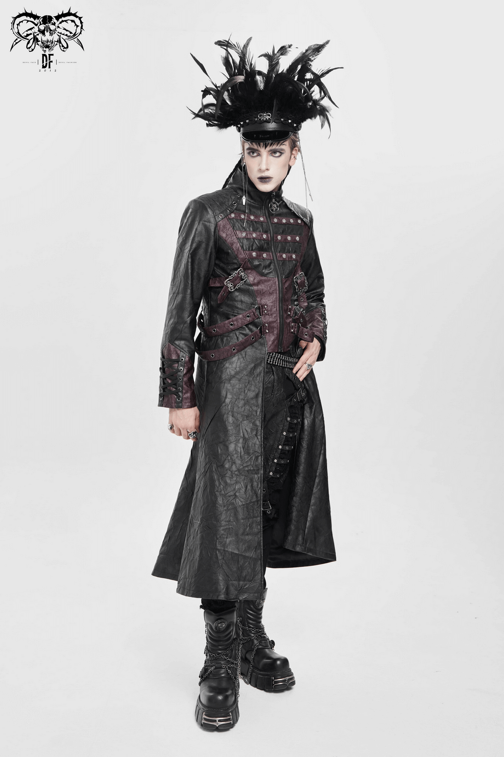 Gothic Long Coat with Buckled Panels and Metal Accents worn by a model in a dramatic pose.