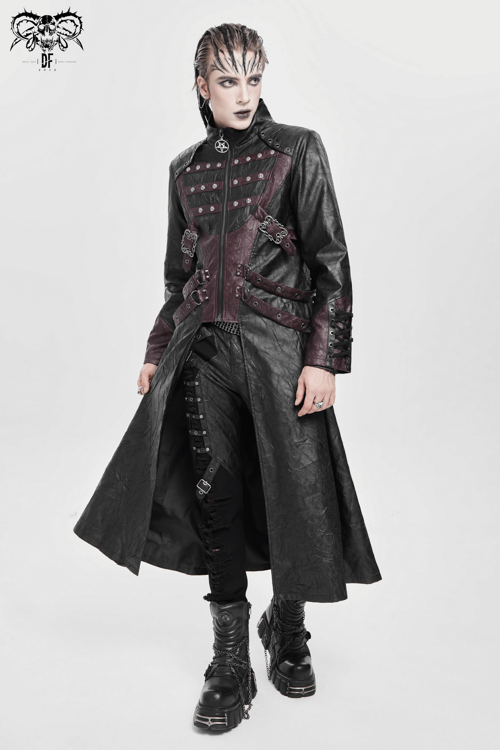 Gothic Long Coat with Buckled Panels and Metal Accents modeled stylishly against a white backdrop.