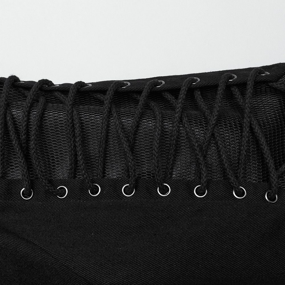 Close-up of gothic long coat featuring X-shaped buckles and intricate mesh detailing for a punk-inspired look.