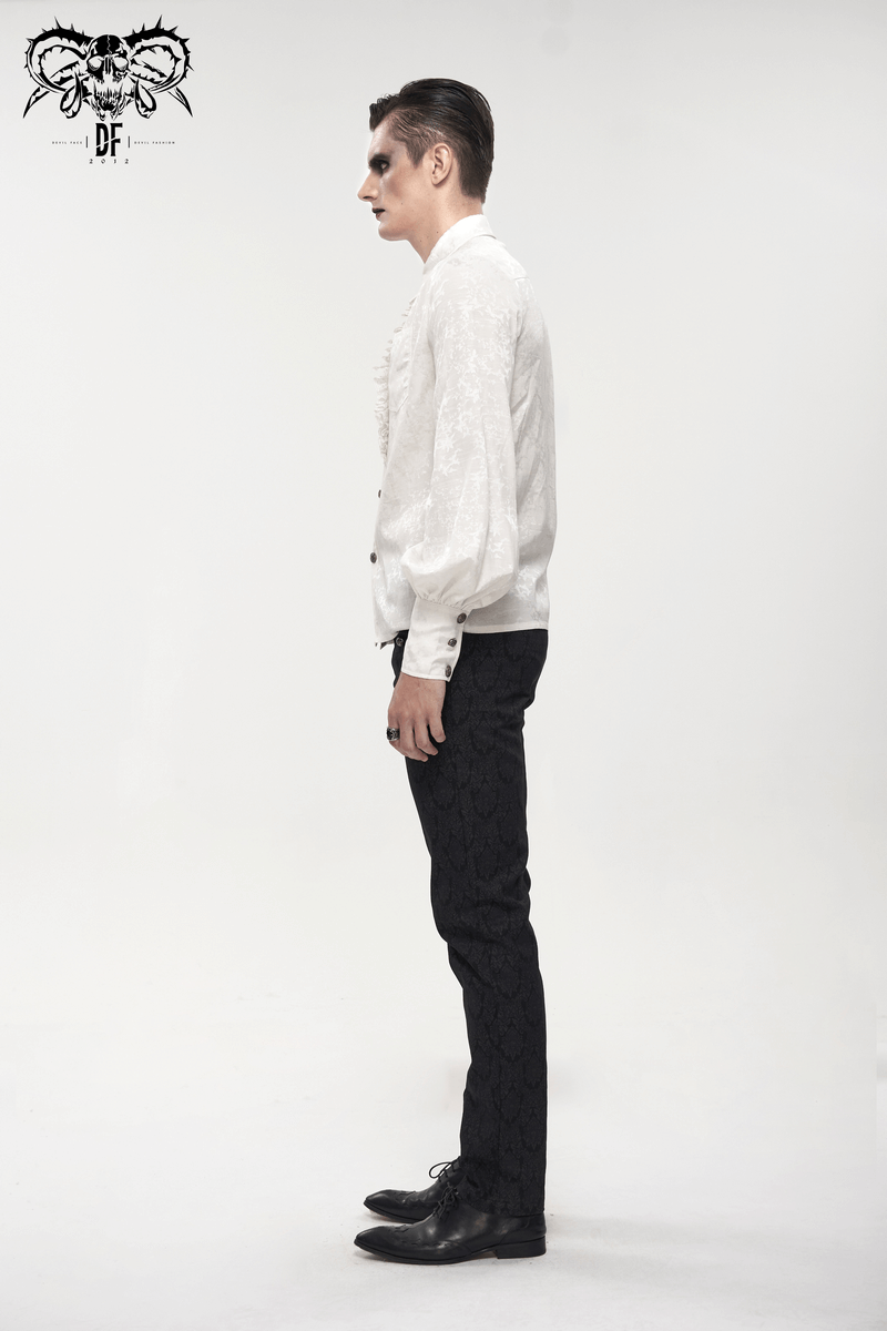 Side view of a male model in a gothic white lantern sleeves shirt with lace ruffles, paired with dark patterned pants.