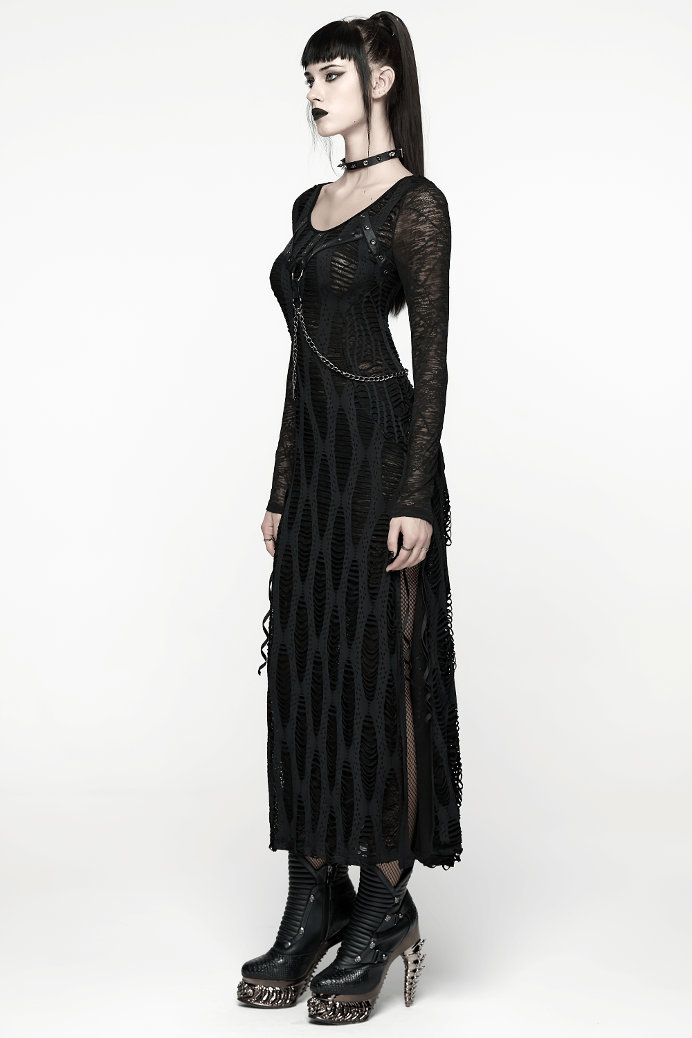 Gothic Long Sleeve Black Dress with Chains and Straps on model, featuring decorative straps and edgy design.
