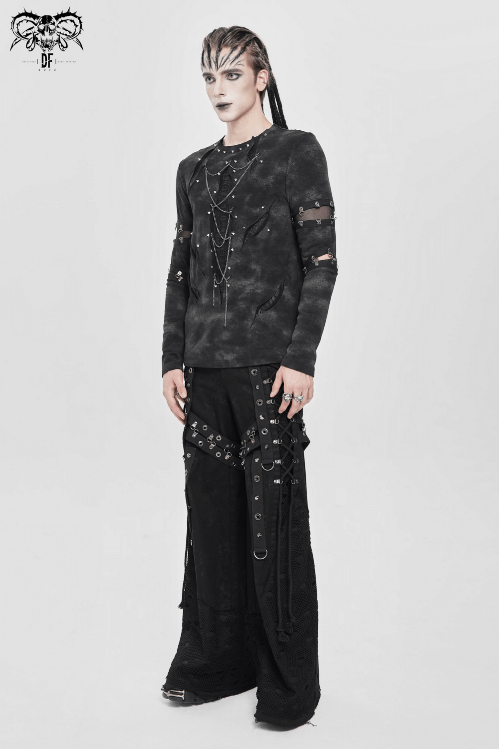 Gothic Long Sleeve Top with Chains and Cutout Design worn with punk-inspired bottom and edgy accessories.