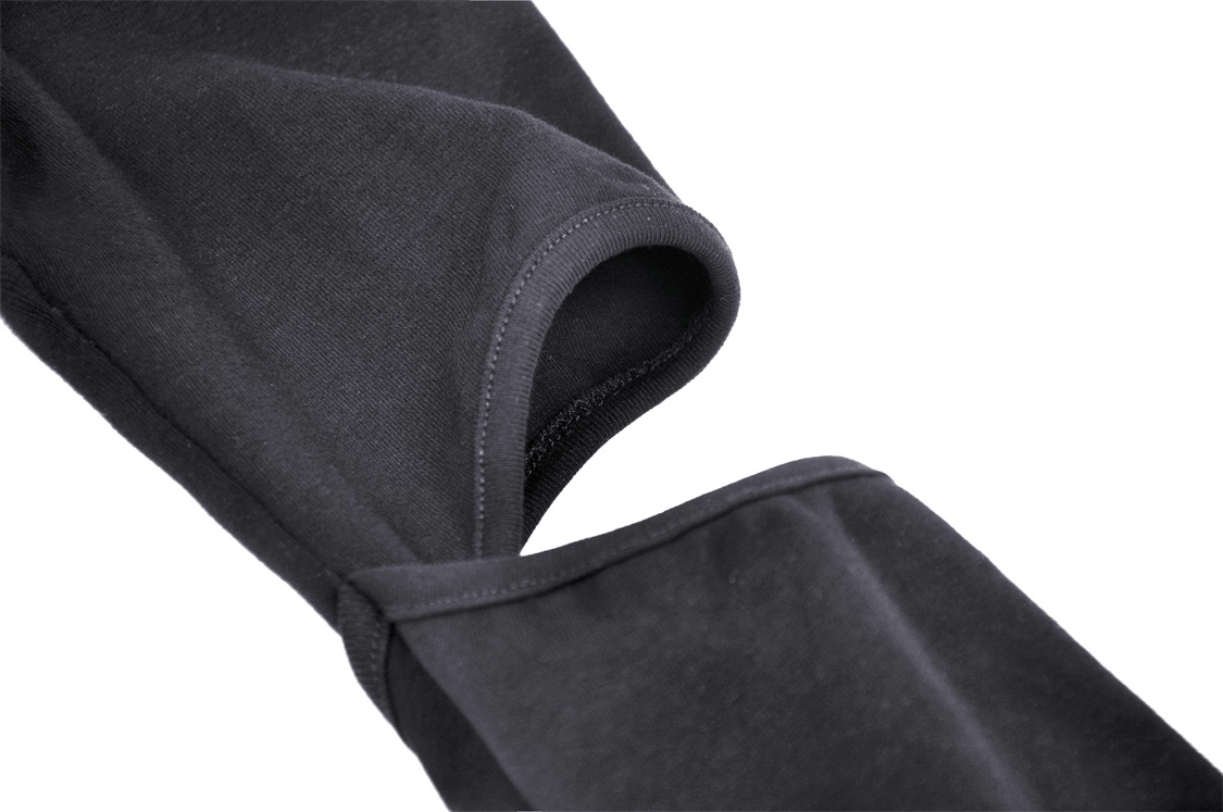 Close-up of Gothic long sleeve black crop top showcasing the hood and cut-out arm design.