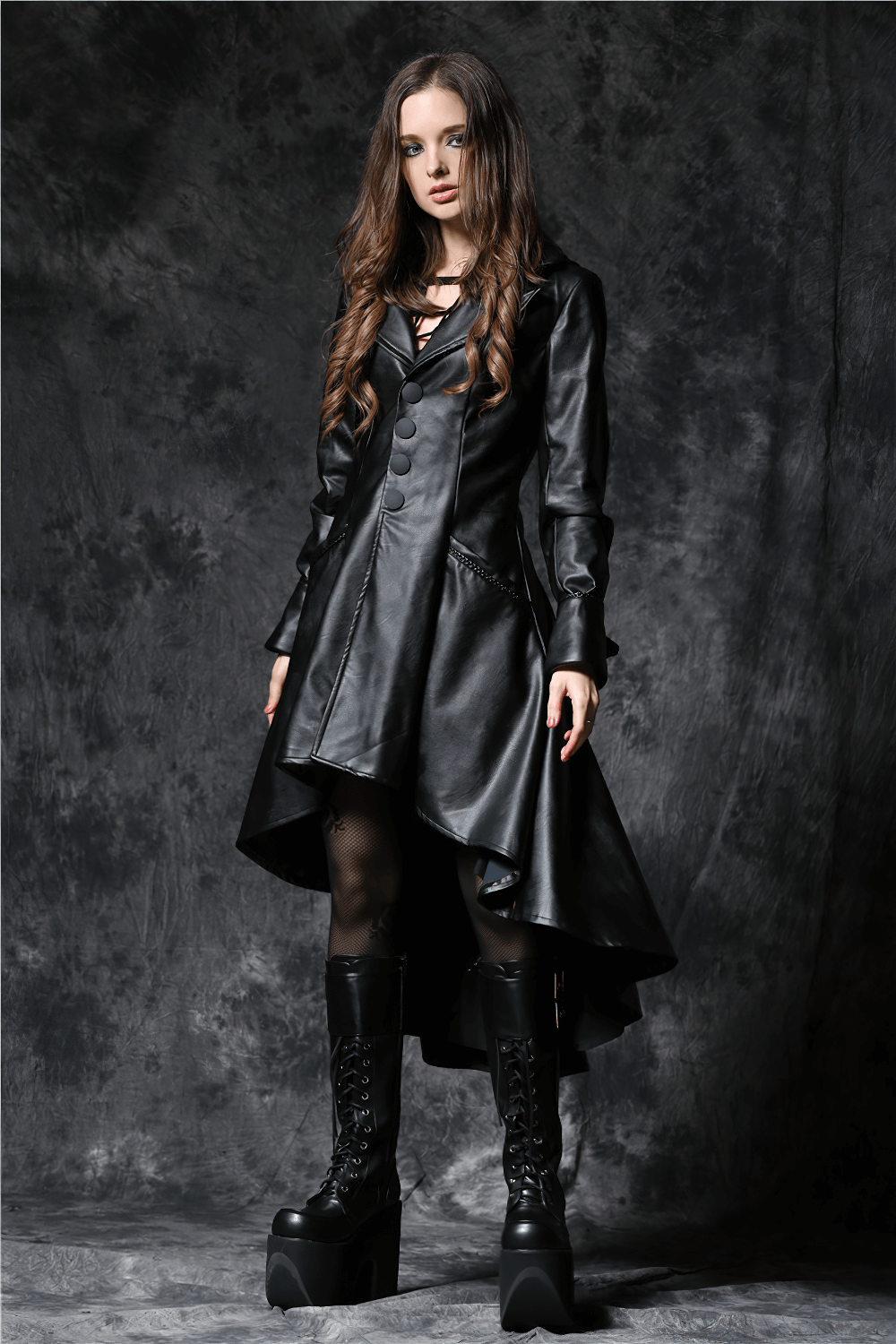 Gothic long tailcoat with hood and button front, paired with edgy black platform boots, exuding steampunk style.