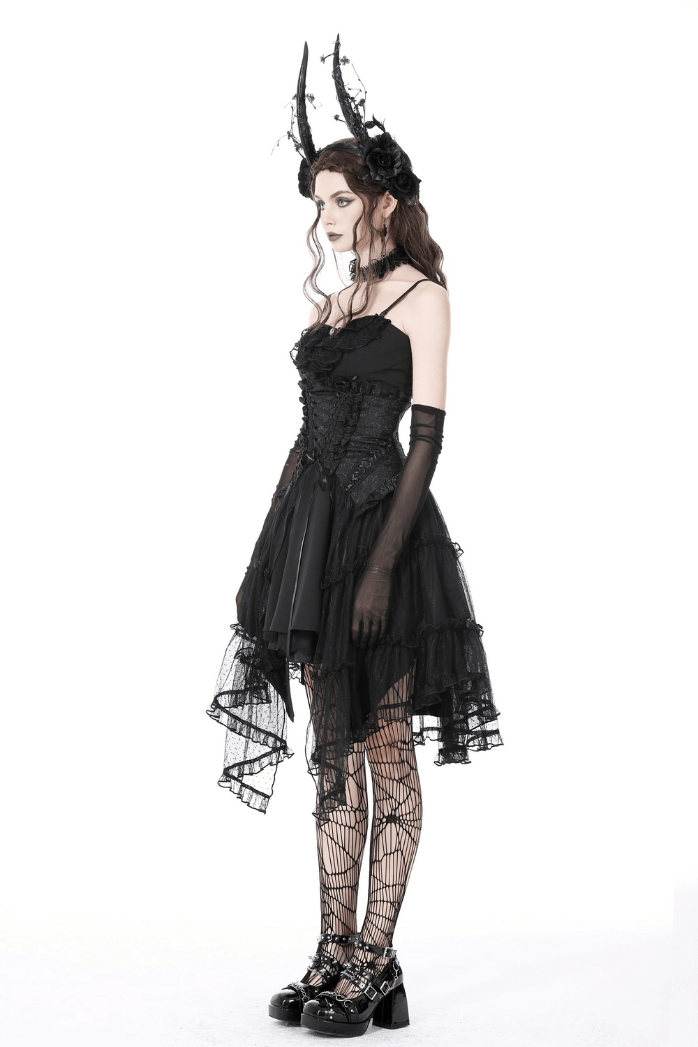 Elegant black gothic mesh skirt with corset belt, featuring layered tulle and dramatic accessories for women.
