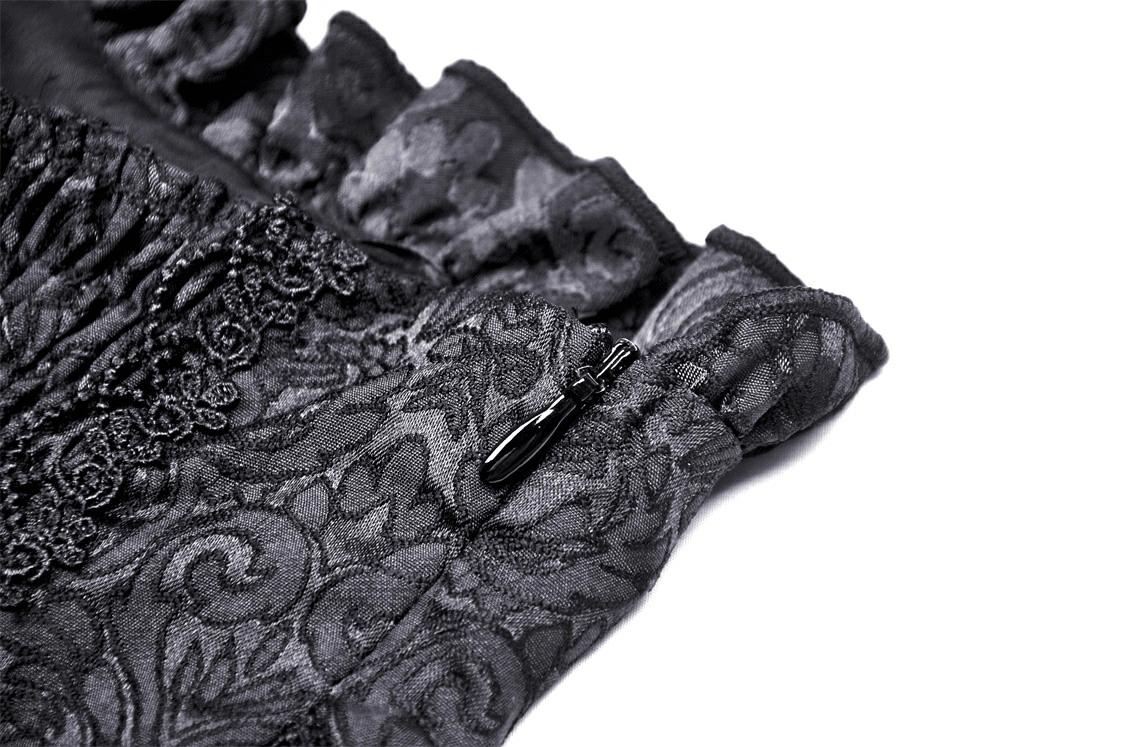 Close-up of black lace detailing and zipper on a Gothic Luxe Mesh Skirt with Corset Belt.