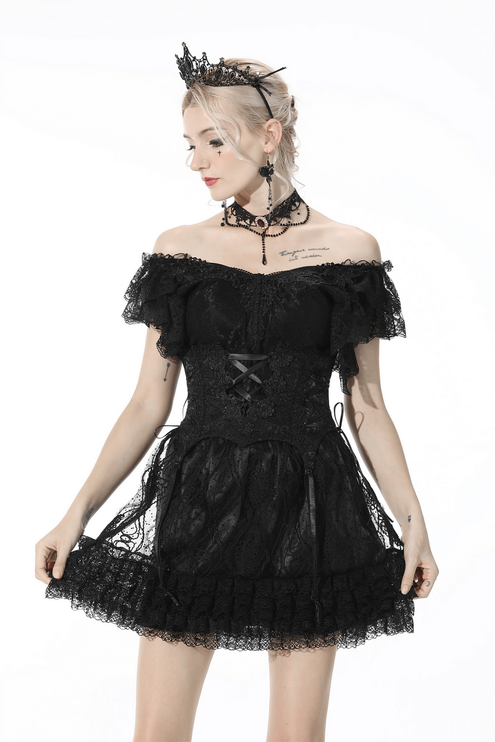 Gothic luxe black lace off-shoulder dress with ruffled sleeves and corset detailing.
