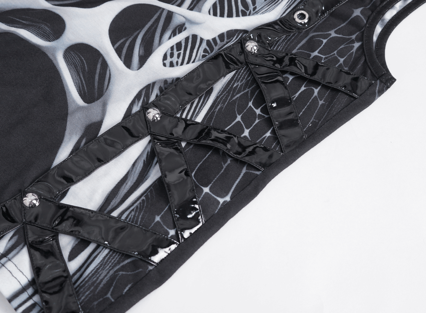 Close-up of Gothic tank top's skeleton graphic and glossy rivets, showcasing edgy and stylish details.