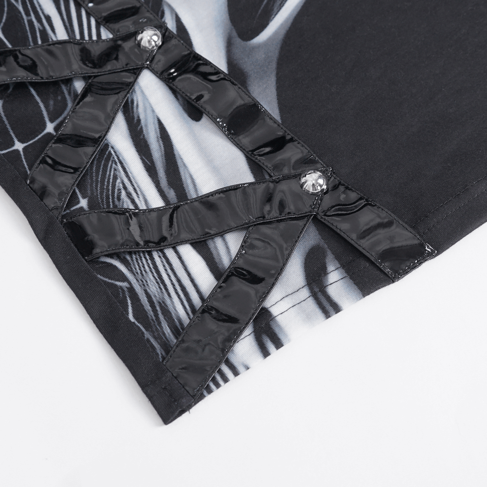 Close-up of Gothic tank top detailing with black rivets and unique skeleton graphic design.