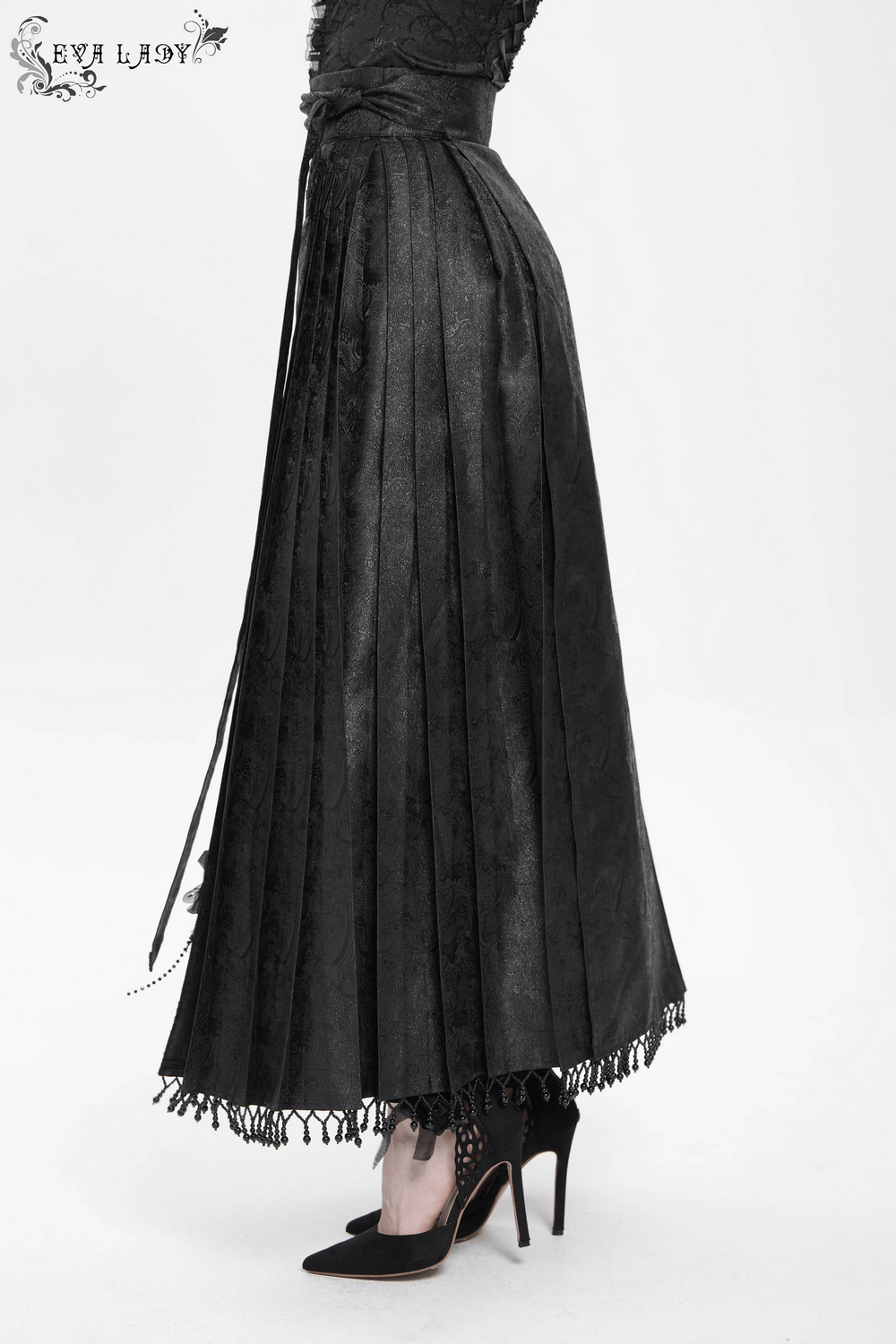 Gothic black maxi skirt featuring lace trim and cascading rose details, perfect for vintage-inspired fashion.