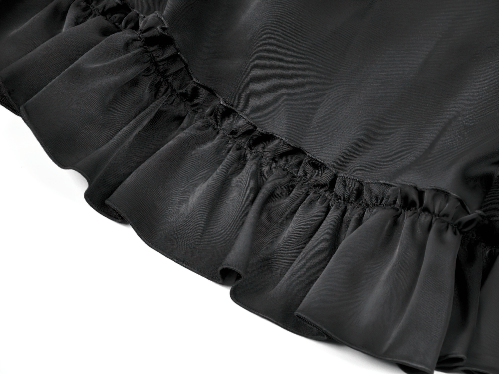 Gothic Maxi Skirt with Red Lace Panel and Ruffles close-up view of ruffled hem detail in black satin fabric.