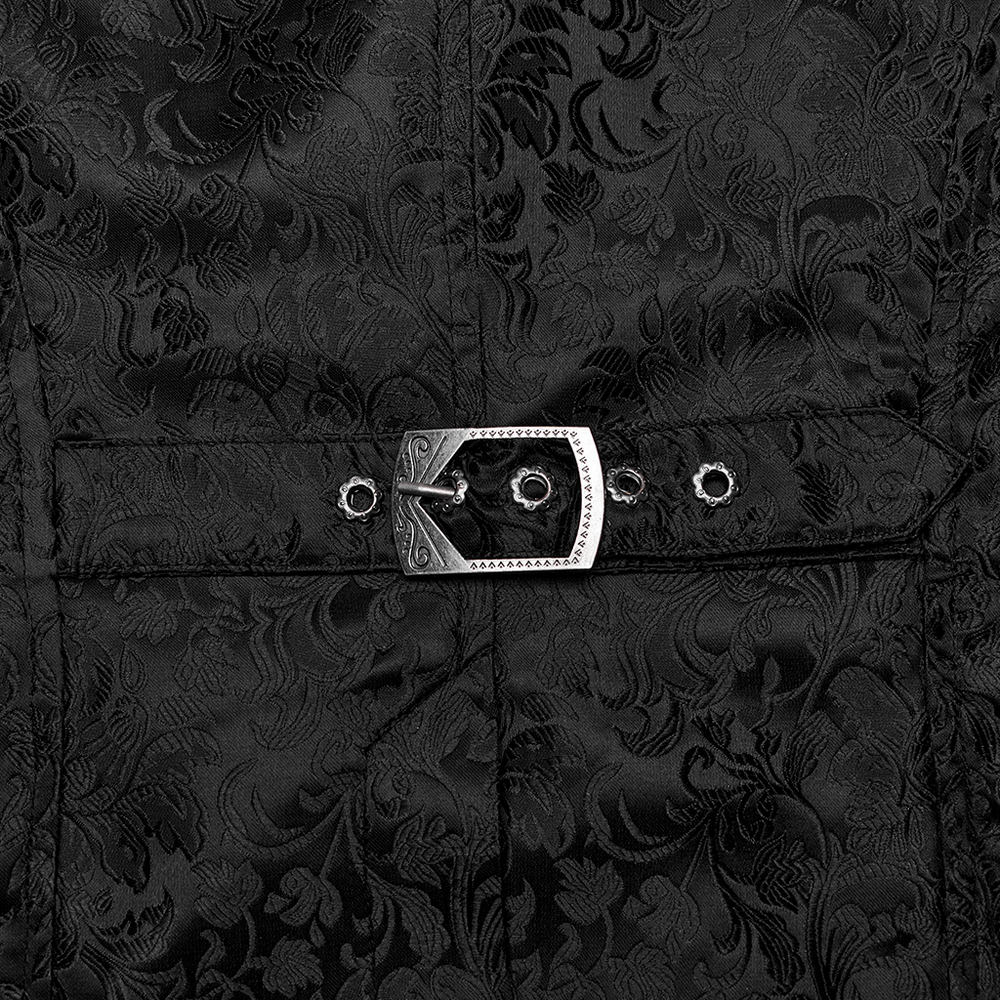 Close-up of gothic jacquard waistcoat with ornate buckle and floral pattern in black fabric.