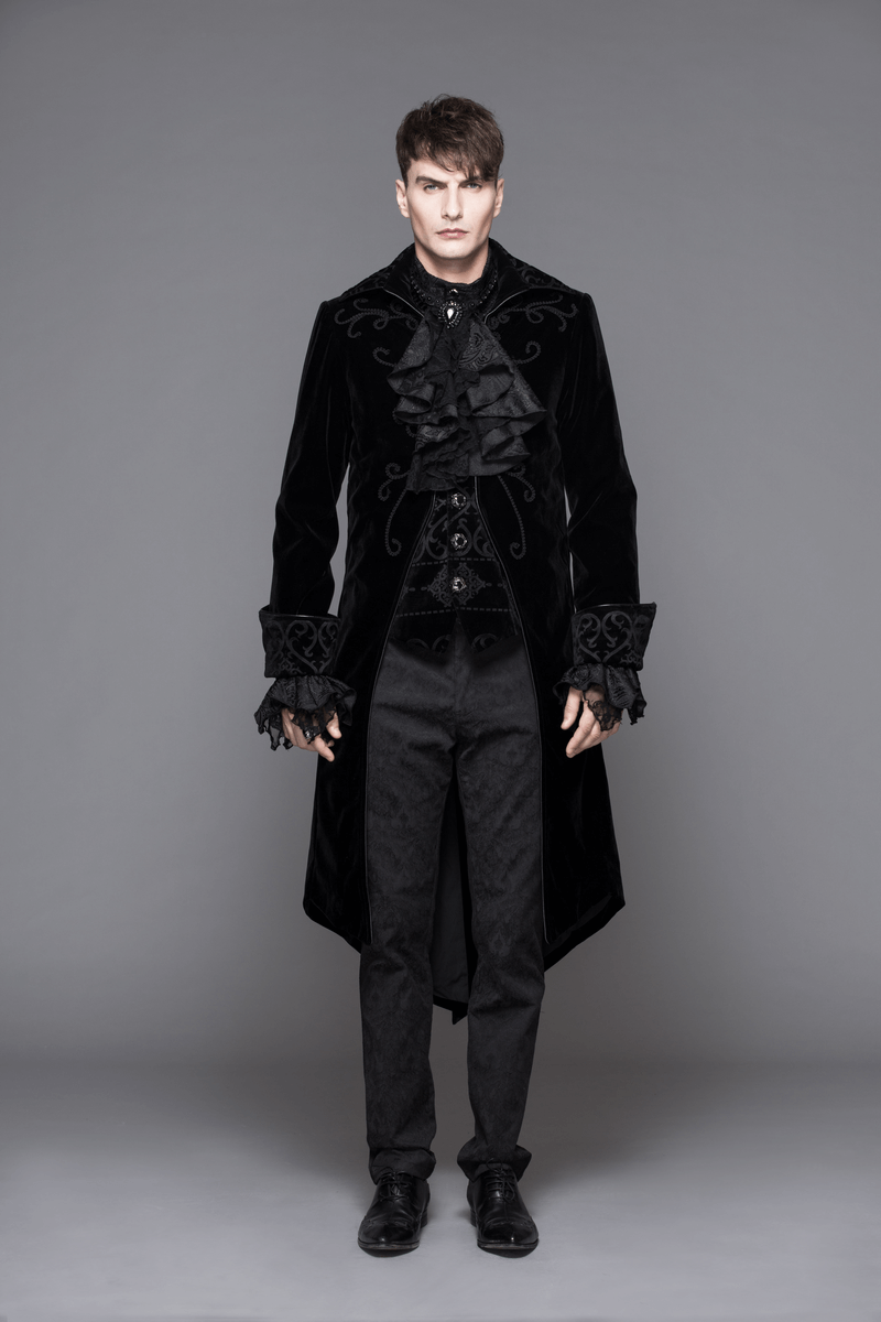 Gothic men's tailcoat in black velvet with ruffles and stylish buttons, perfect for steampunk fashion enthusiasts.