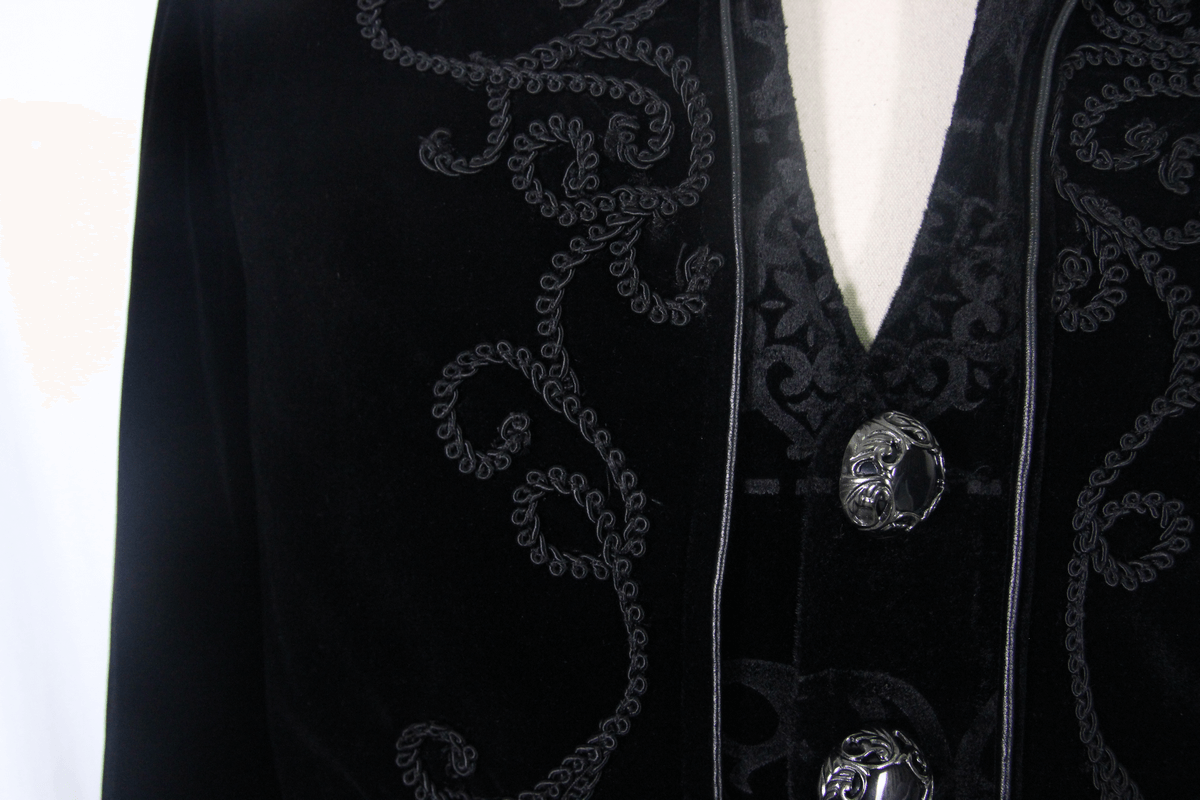 Gothic men's black velvet tailcoat featuring intricate embroidery and stylish buttons, perfect for steampunk fashion.