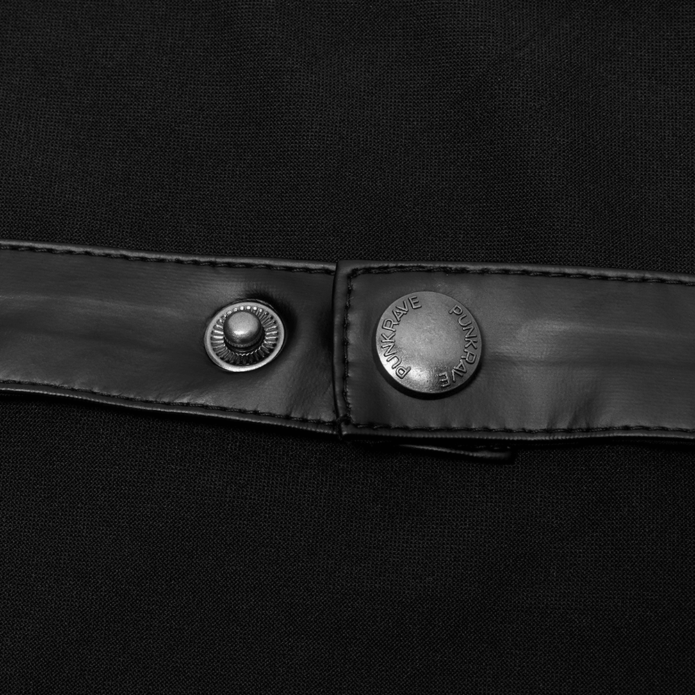 Close-up of gothic faux leather strap detail with stylish buttons, adding edgy flair to alternative fashion.