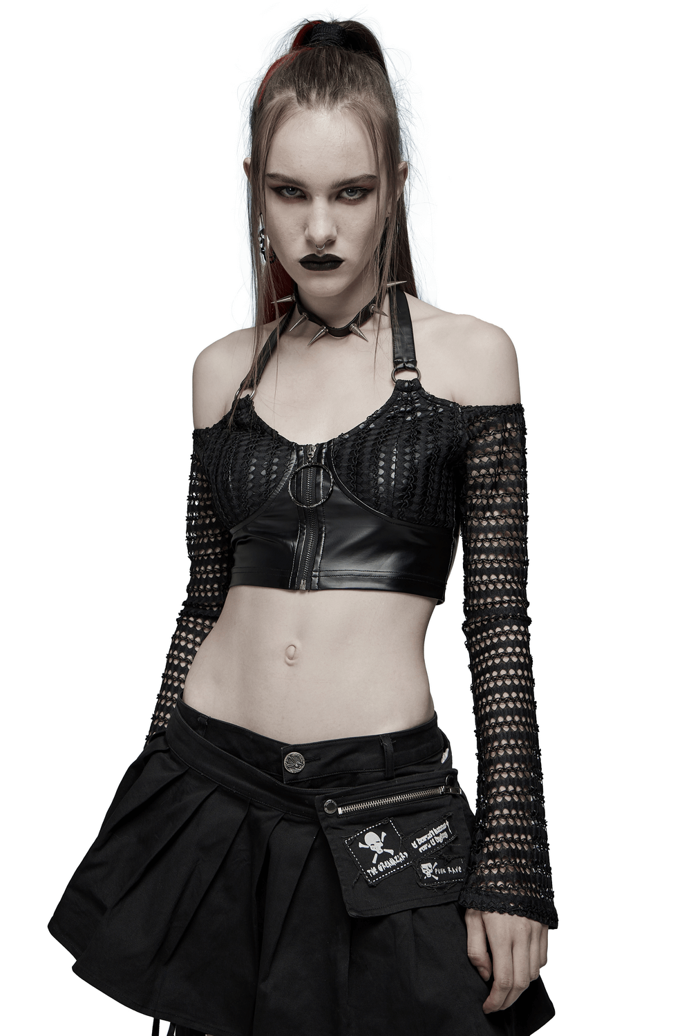 Model showcasing a Gothic mesh and faux leather off-shoulder crop top with a front zipper and stylish black skirt.