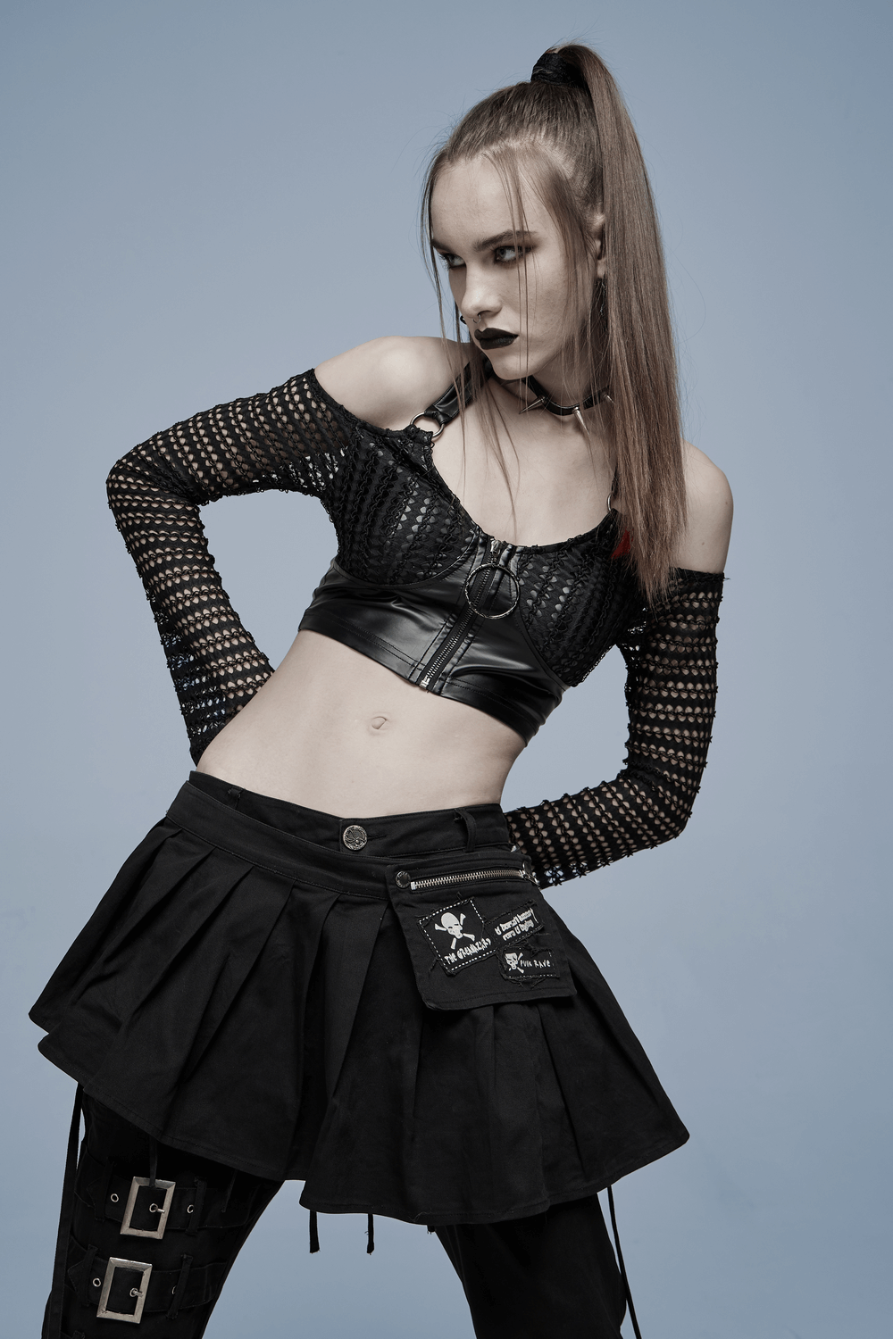 Sexy gothic off-shoulder crop top with mesh sleeves and faux leather, highlighting edgy alternative fashion.