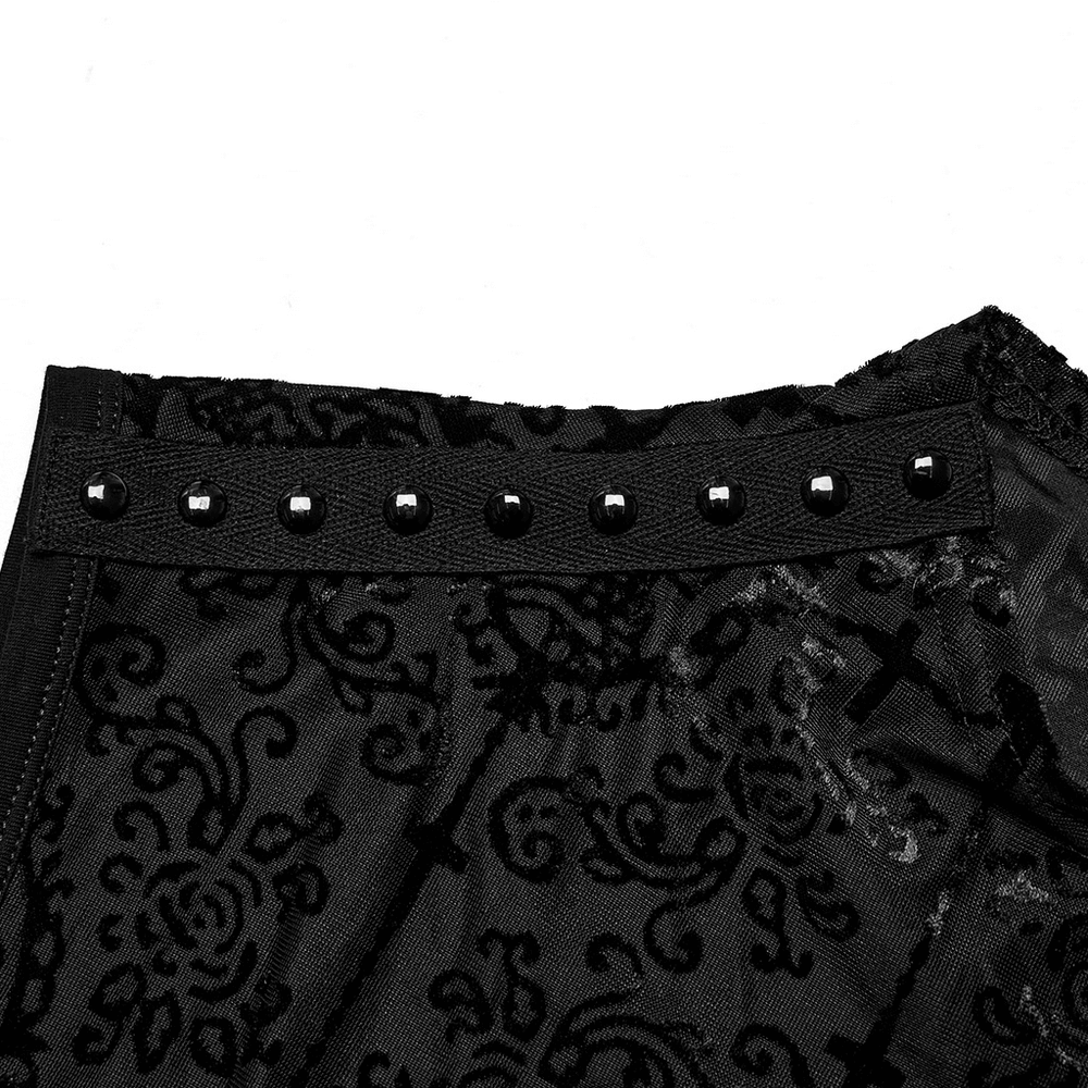 Close-up of Gothic black mesh top with flocking pattern and decorative webbing details for a stylish look.