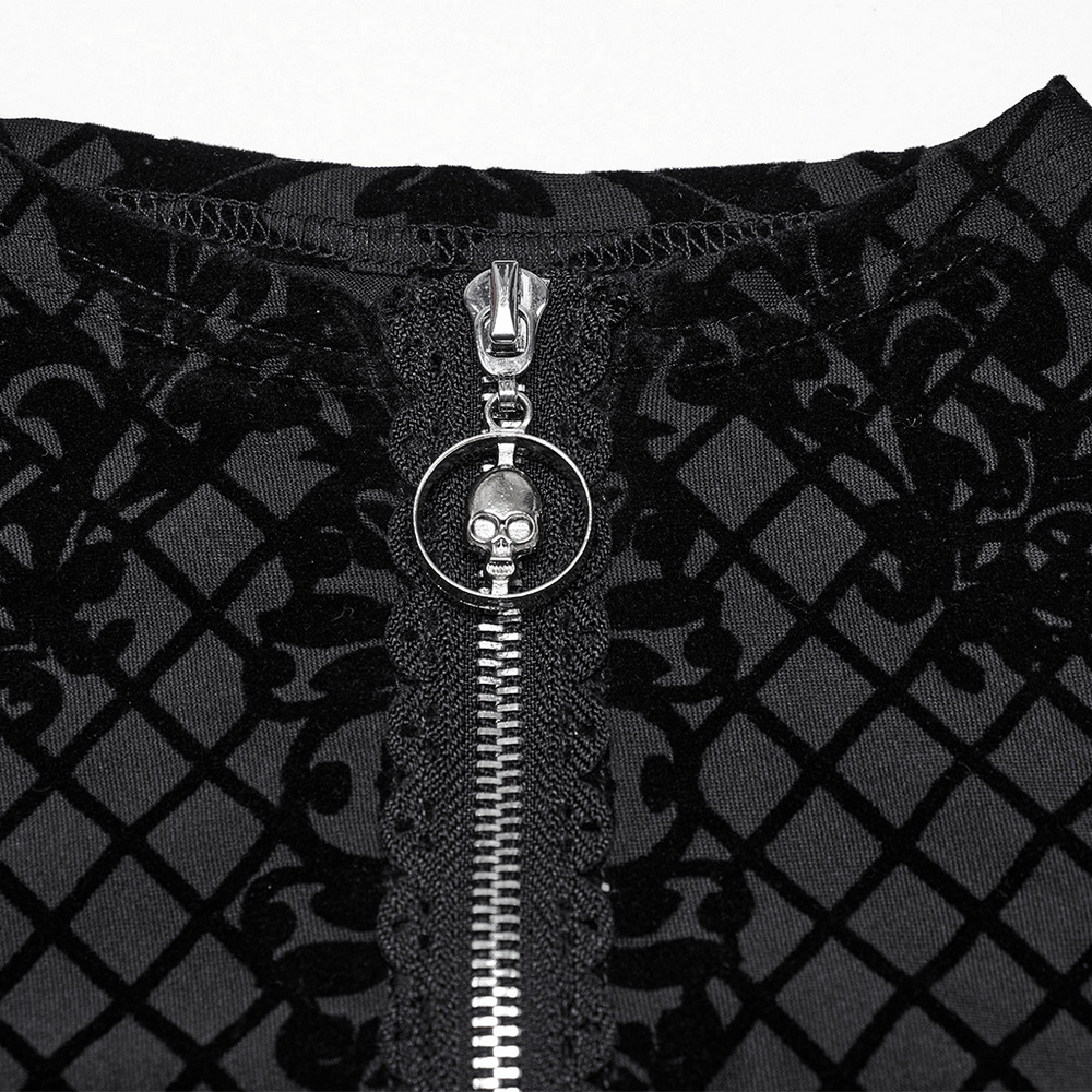 Close-up of Gothic mesh crop jacket's skull zipper detail and intricate print design.