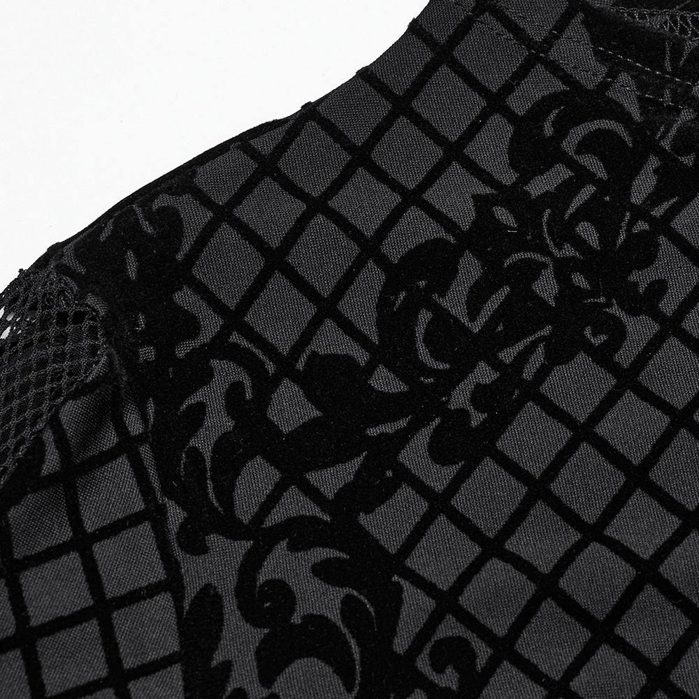 Close-up of Gothic mesh flocking fabric with floral prints, showcasing the edgy design of a crop jacket.