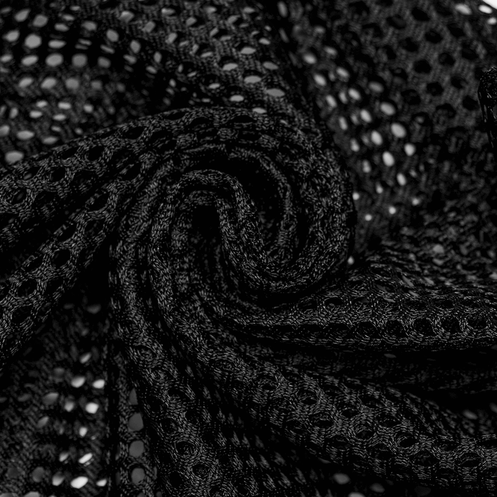 Close-up of black mesh fabric showcasing a unique perforated design, perfect for gothic and punk styles.