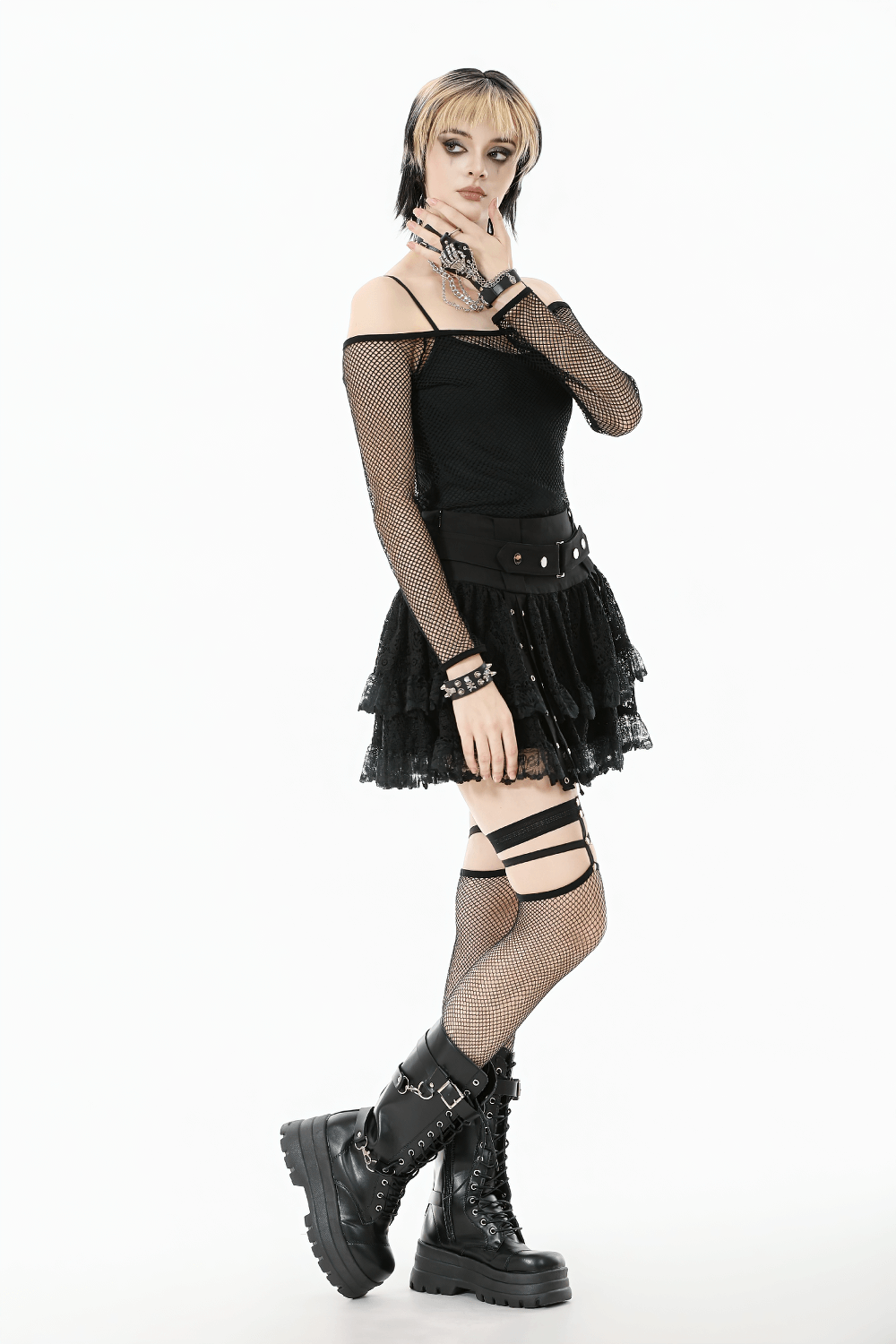 Gothic Mesh Off-Shoulder Long-Sleeved Top for Women styled with a layered skirt and edgy accessories.