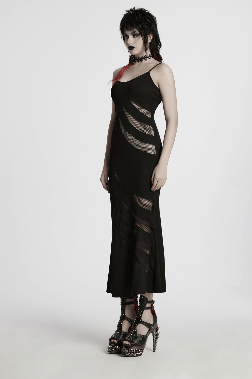 Model showcasing gothic mesh panel dress with claw slashed design, perfect for punk-inspired edgy fashion.