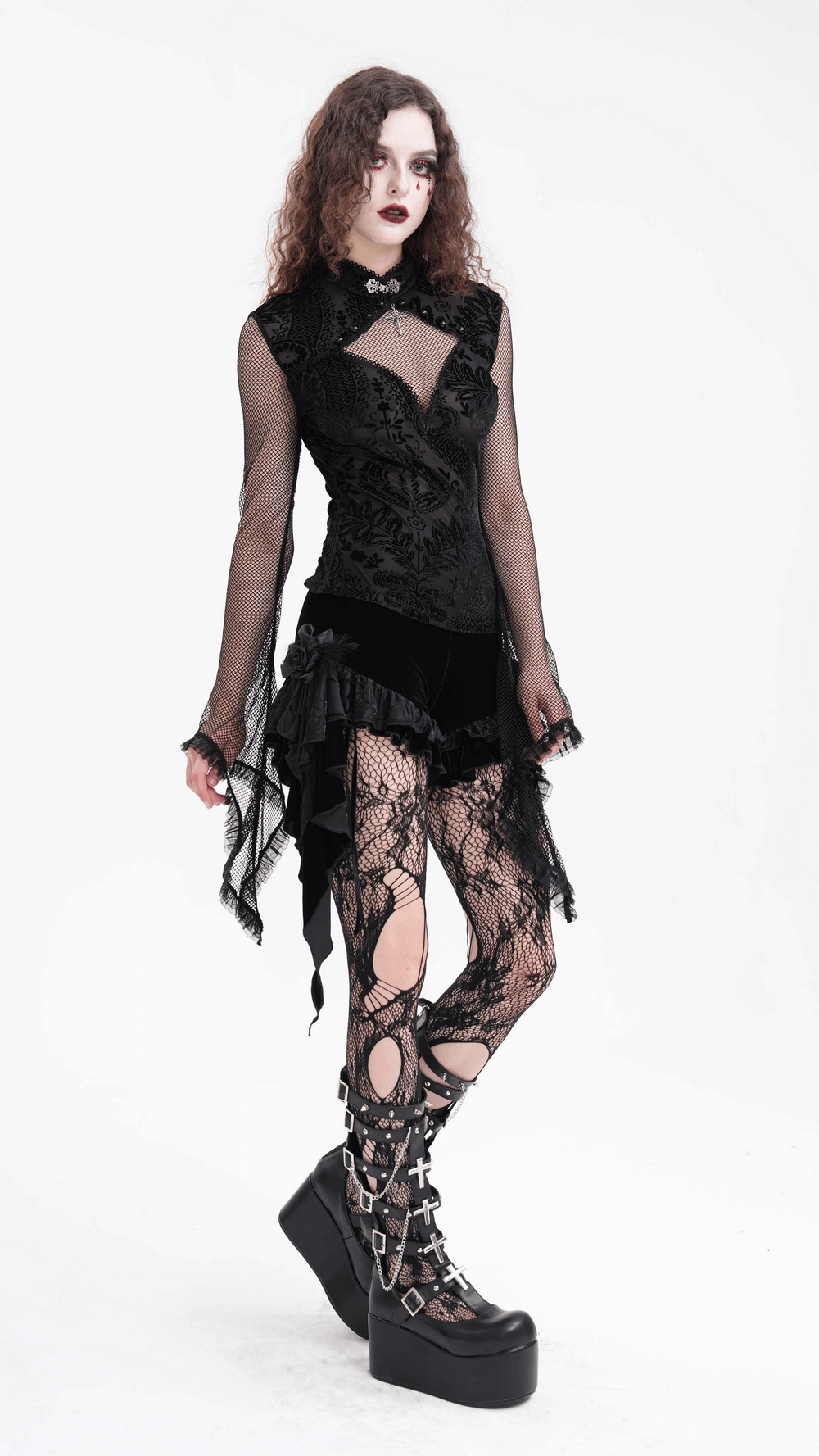 Gothic mesh sleeve top with lace pattern, dramatic sleeves, and stylish footwear for alternative fashion lovers.