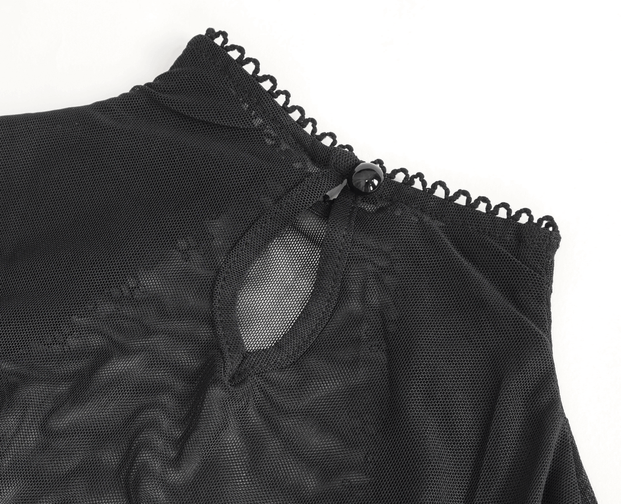 Close-up of black gothic mesh top neckline featuring a decorative button and elegant lace trim.
