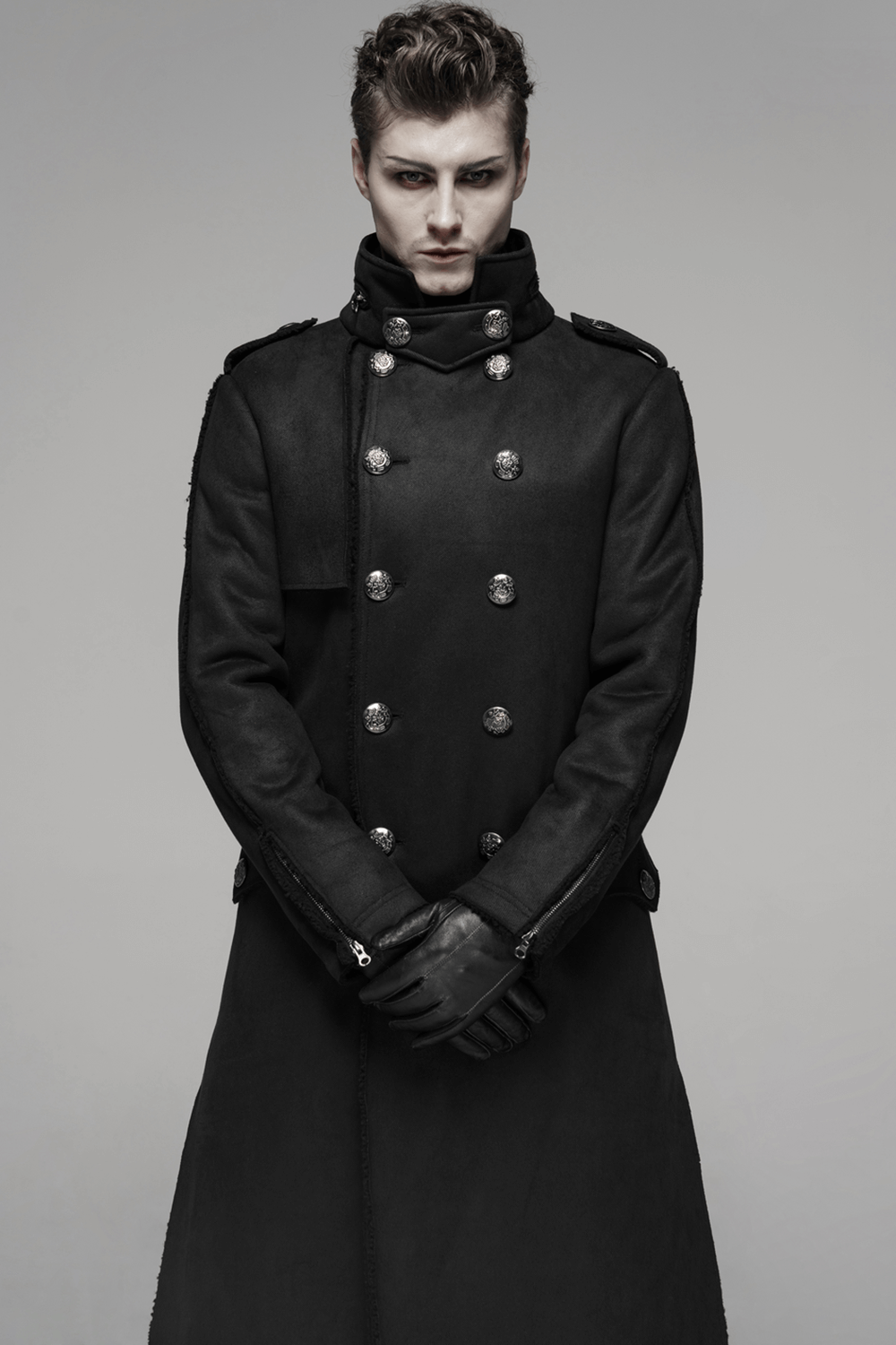 Gothic military-inspired long coat with velvet detailing and double-breasted design, enhancing a commanding look.