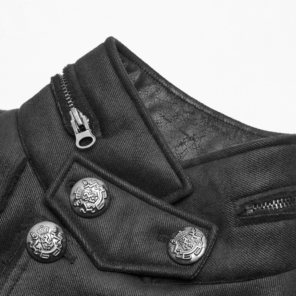 Close-up of the double-breasted black gothic military coat with buttons and zip detailing.