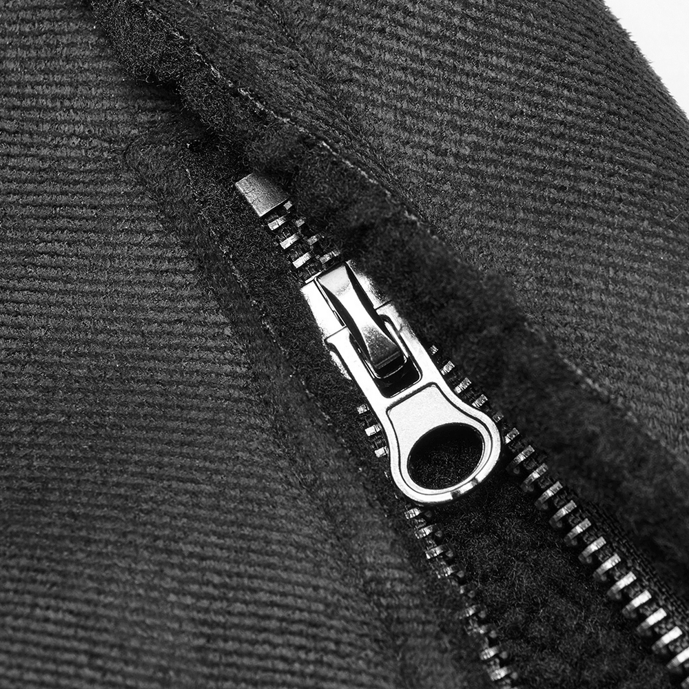 Close-up of a sleek black zipper on a military-inspired coat, showcasing quality and detail.