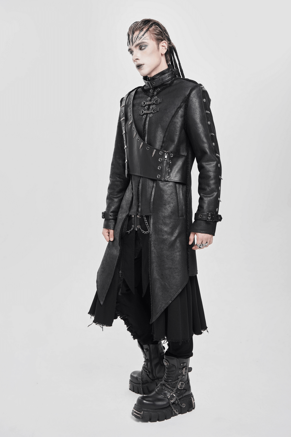 Gothic Military Long Coat with Spiked Shoulders and Straps worn by a model, showcasing a dramatic trench coat silhouette.