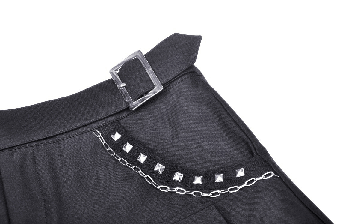 Close-up of the gothic mini skirt showcasing studded details and chain embellishments.