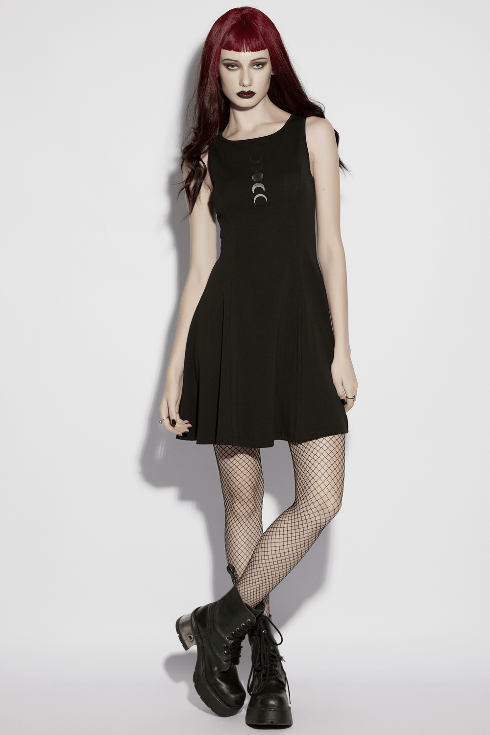 Alt Tag: Gothic Moon Phase Skater Black Dress for Women on model, ribbed black skater dress with gradient crescent moon print
