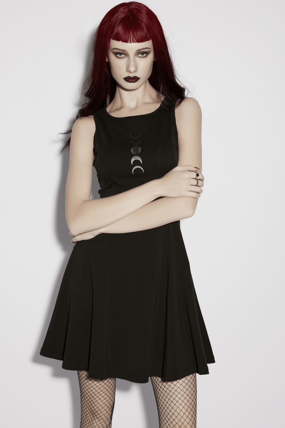 Alt Tag: Gothic Moon Phase Skater Black Dress for Women with crescent moon print, ribbed fabric, minimalist witchy skater silhouette