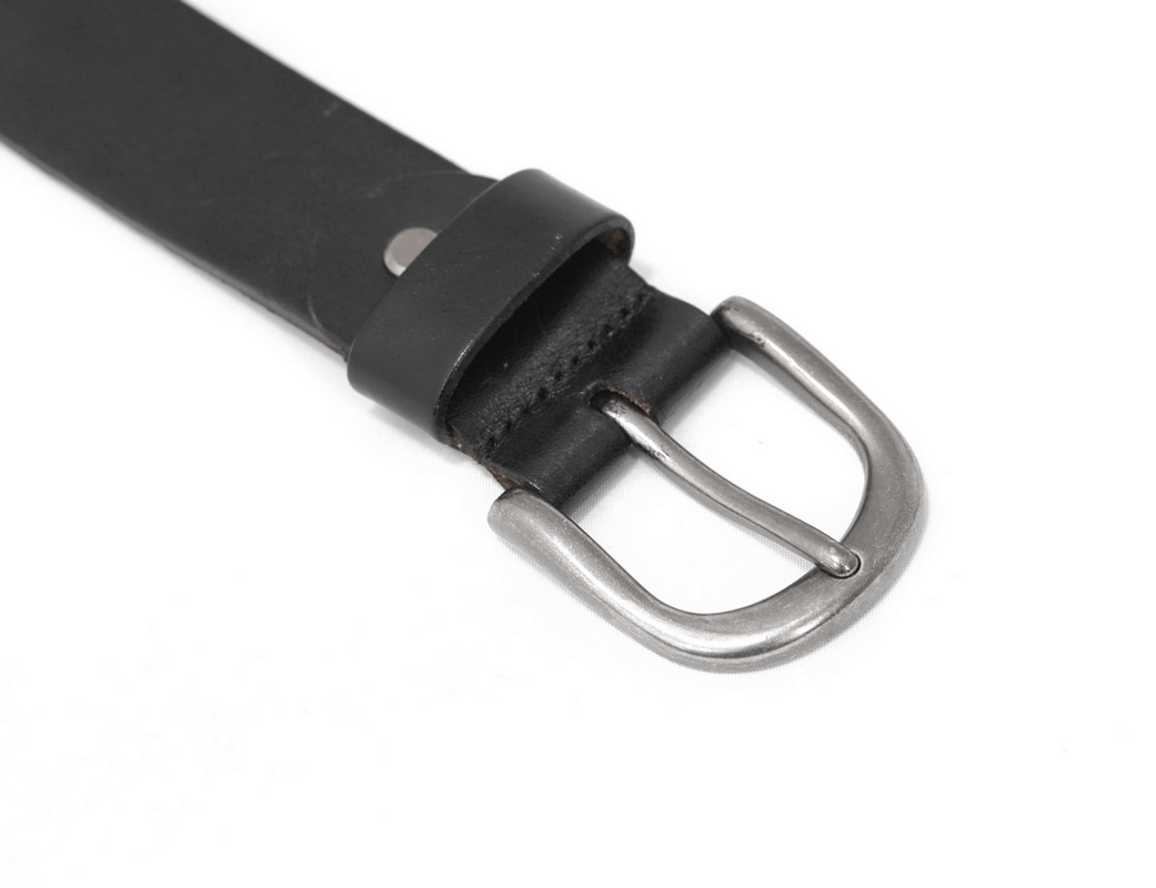 Close-up of gothic motorcycle chain belt with metal buckle and leather strap, perfect for men's fashion.