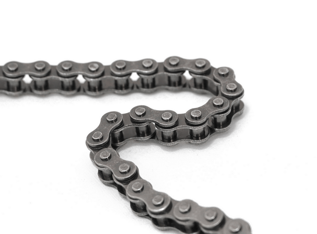 Close-up of a gothic motorcycle chain belt made of durable metal links for stylish men's fashion.