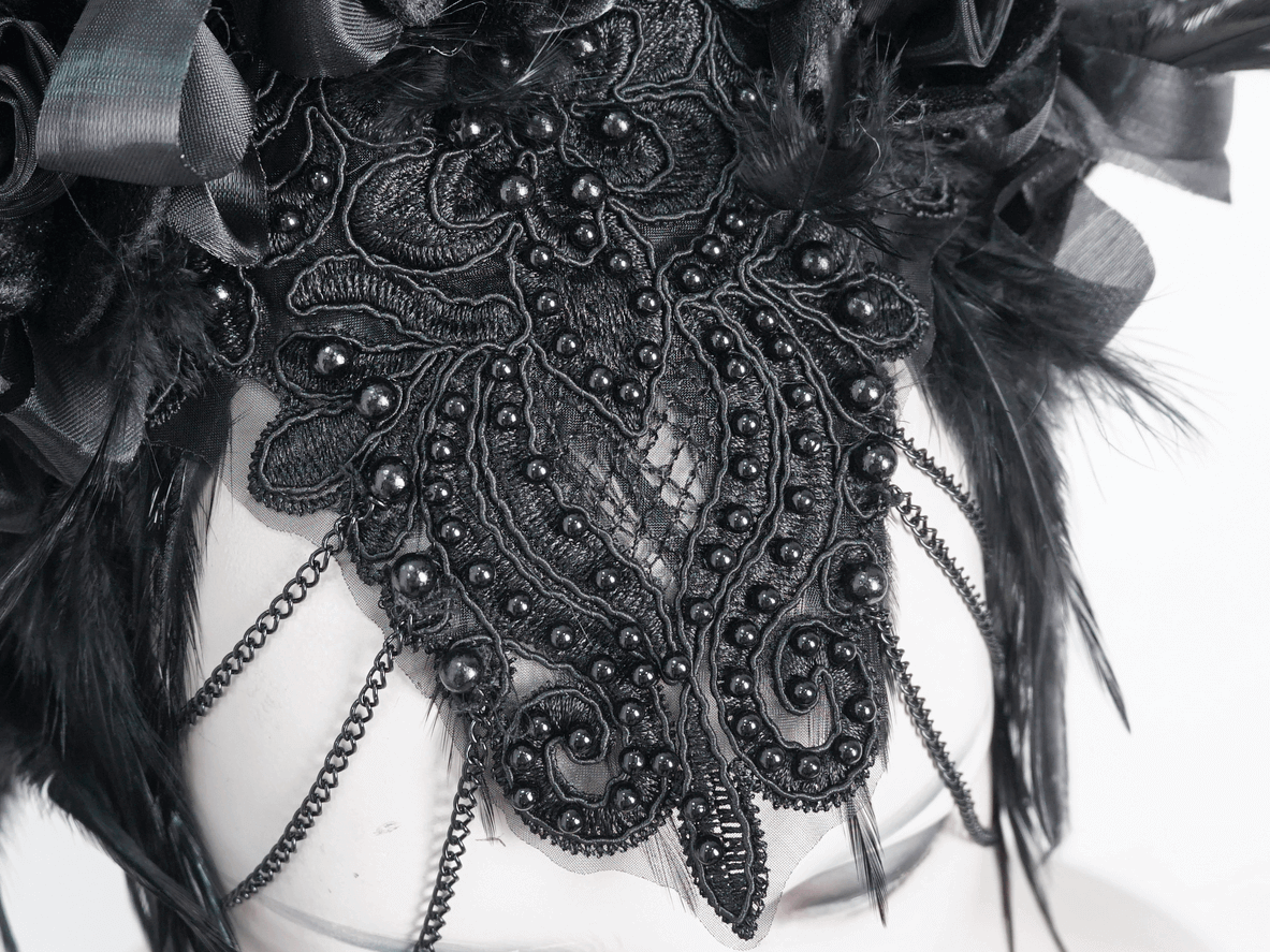 Gothic noir feather crown featuring black floral accents and intricate beading, perfect for special events.