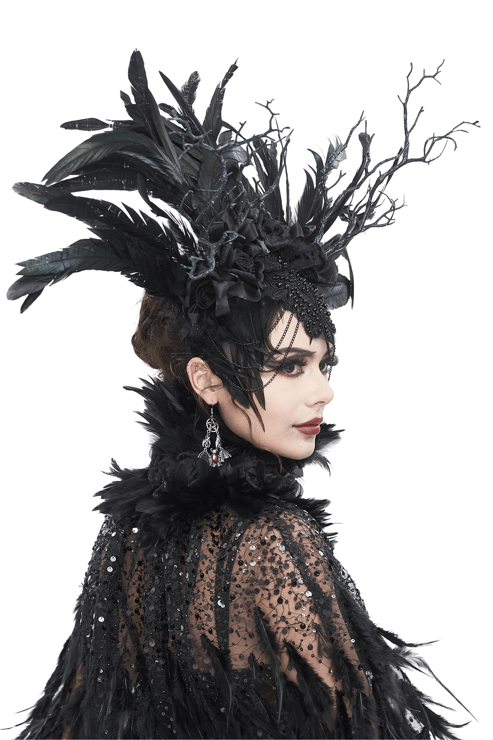 Gothic noir feather crown with floral accents, perfect for elegant themed parties and special events.