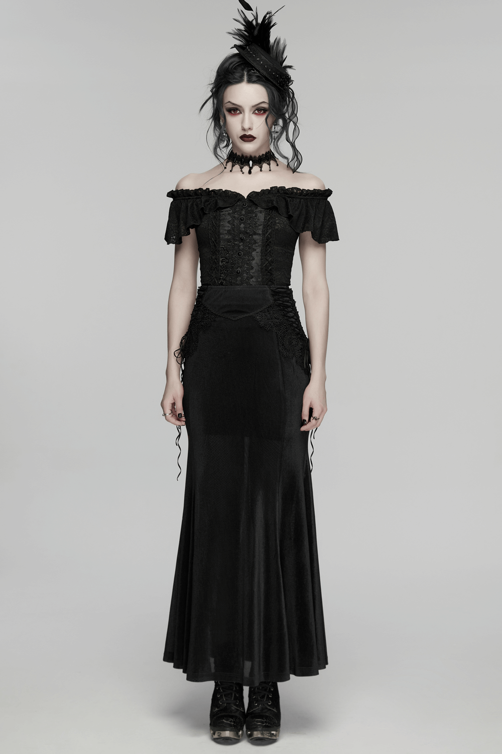 Gothic Off Shoulder Lace Corset Top with Ruffles worn by a model, featuring elegant draped sleeves and corset-style cinch.