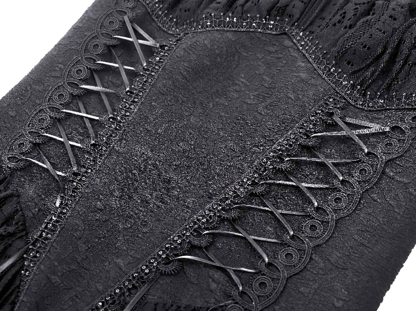 Close-up of intricate black lace detailing on Gothic off-shoulder high-low dress for women.
