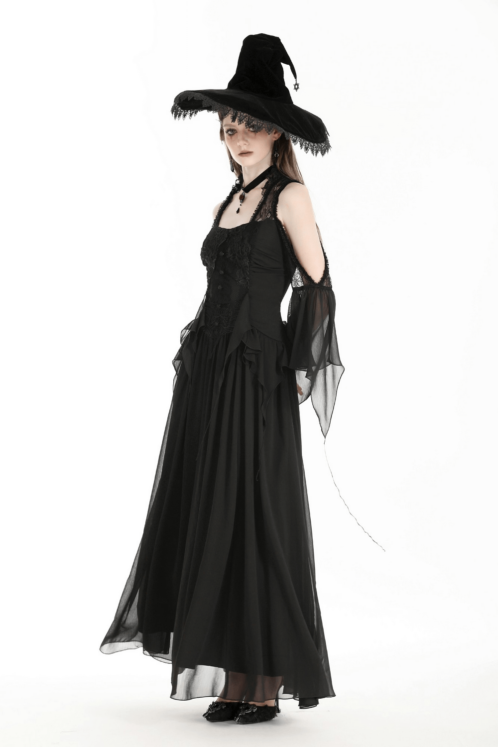 Black off-shoulder lace maxi dress with ruffle sleeves and witch hat, perfect for Halloween or mystical occasions.