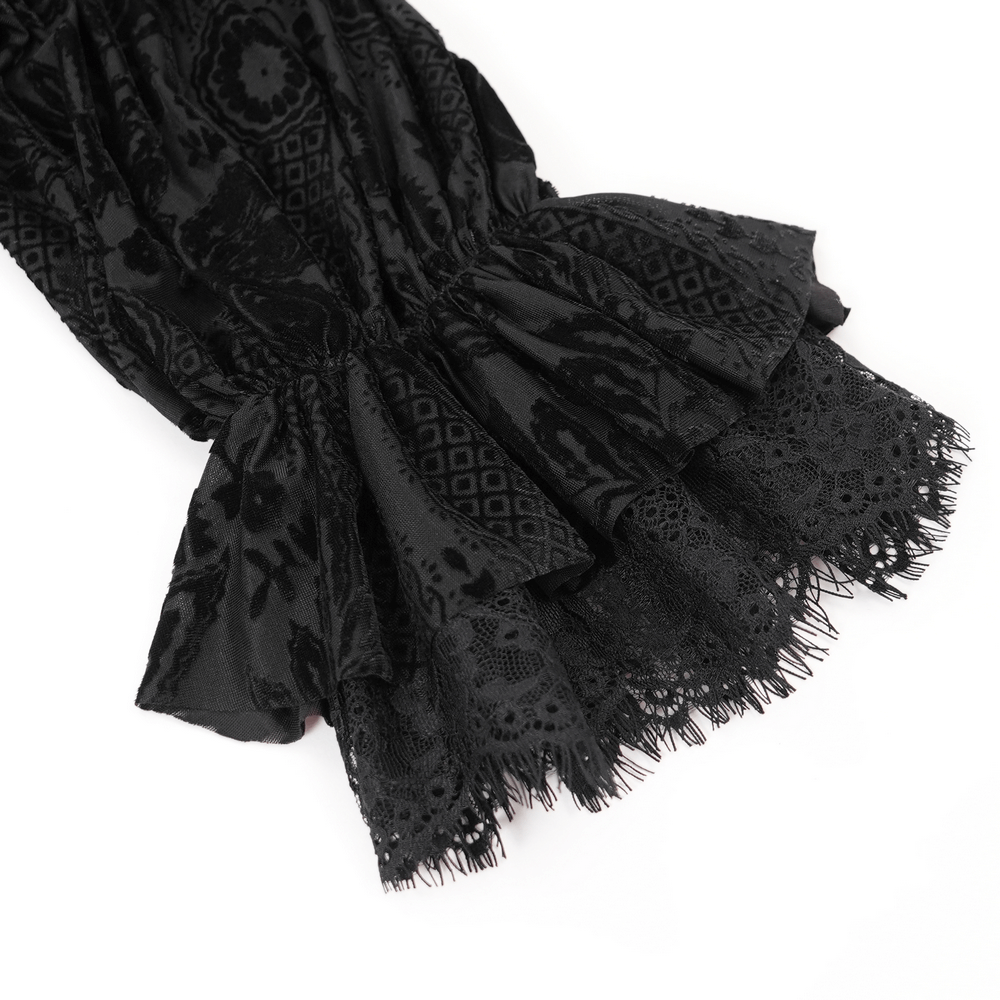 Elegant black velvet blouse with ruffled lace trim and gothic floral details, perfect for a dark romantic style.