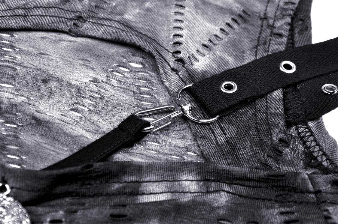 Detail of a Gothic off-shoulder top with cutout design and skull pendant, showcasing edgy fashion style.