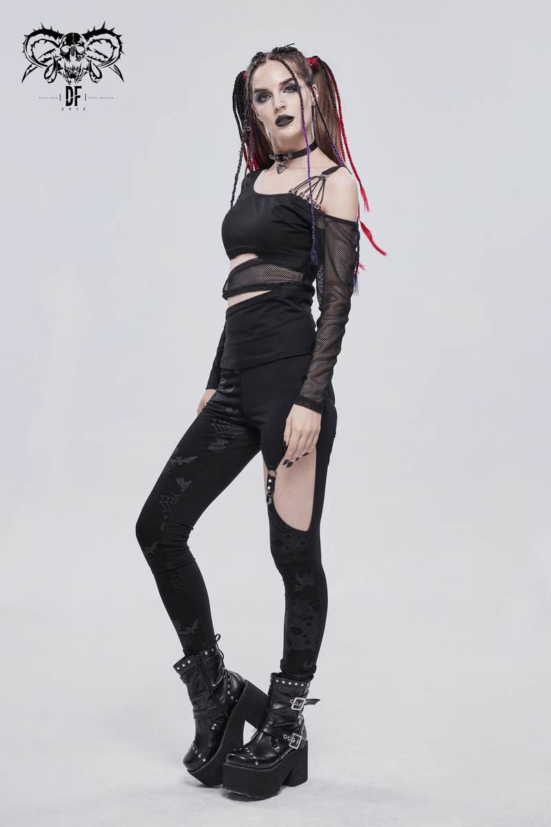 Gothic off shoulder mesh splice top worn with stylish edgy leggings, perfect for a trendy gothic look.