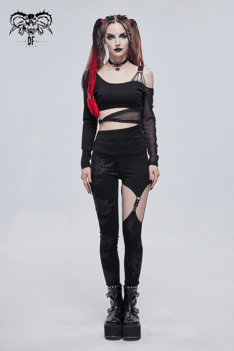 Model wearing a gothic off-shoulder mesh top and stylish black leggings with ripped details, showcasing a trendy dark look.