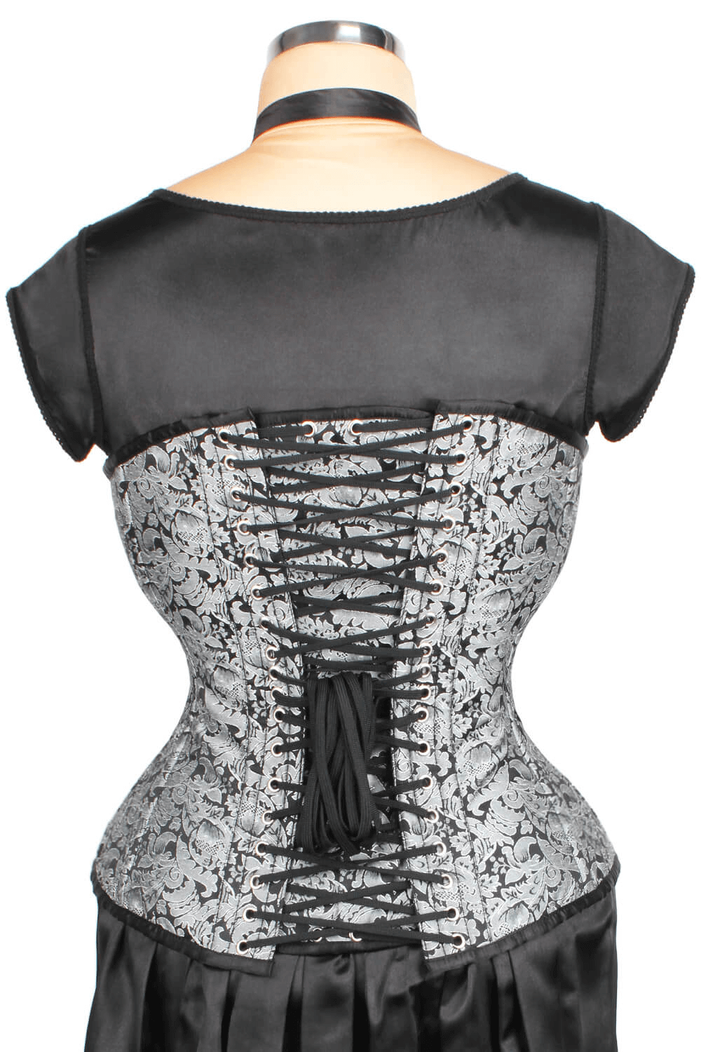 Gothic overbust corset with intricate lace-up back, designed for waist training and tight lacing, offering an hourglass silhouette.