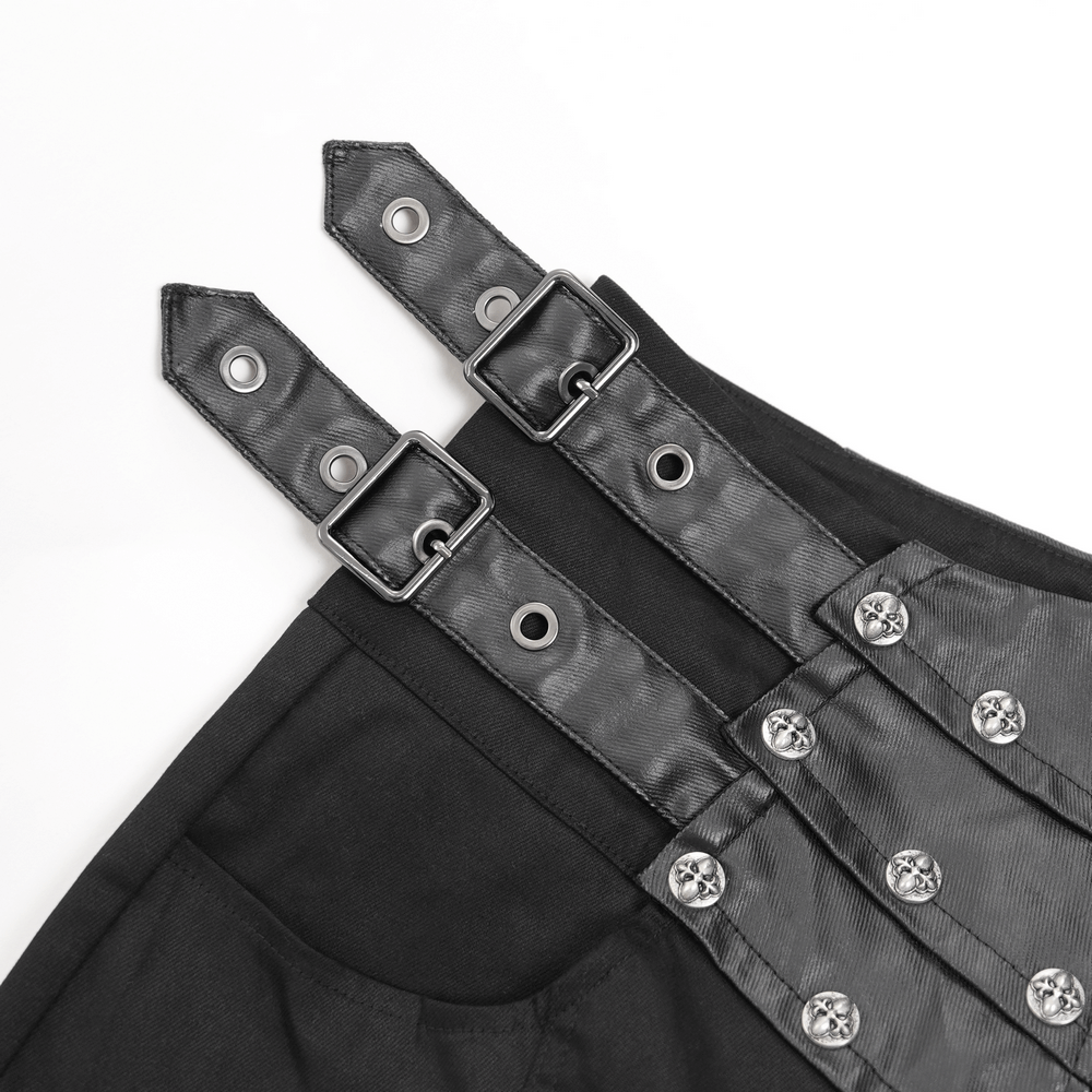 Close-up of Gothic pants with leather straps and metal studs for a bold streetwear look.