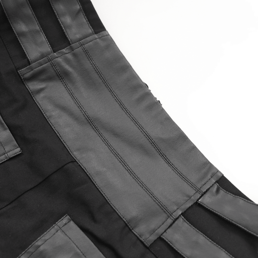 Close-up of gothic pants showcasing leather panels and stitching details for a bold streetwear look.